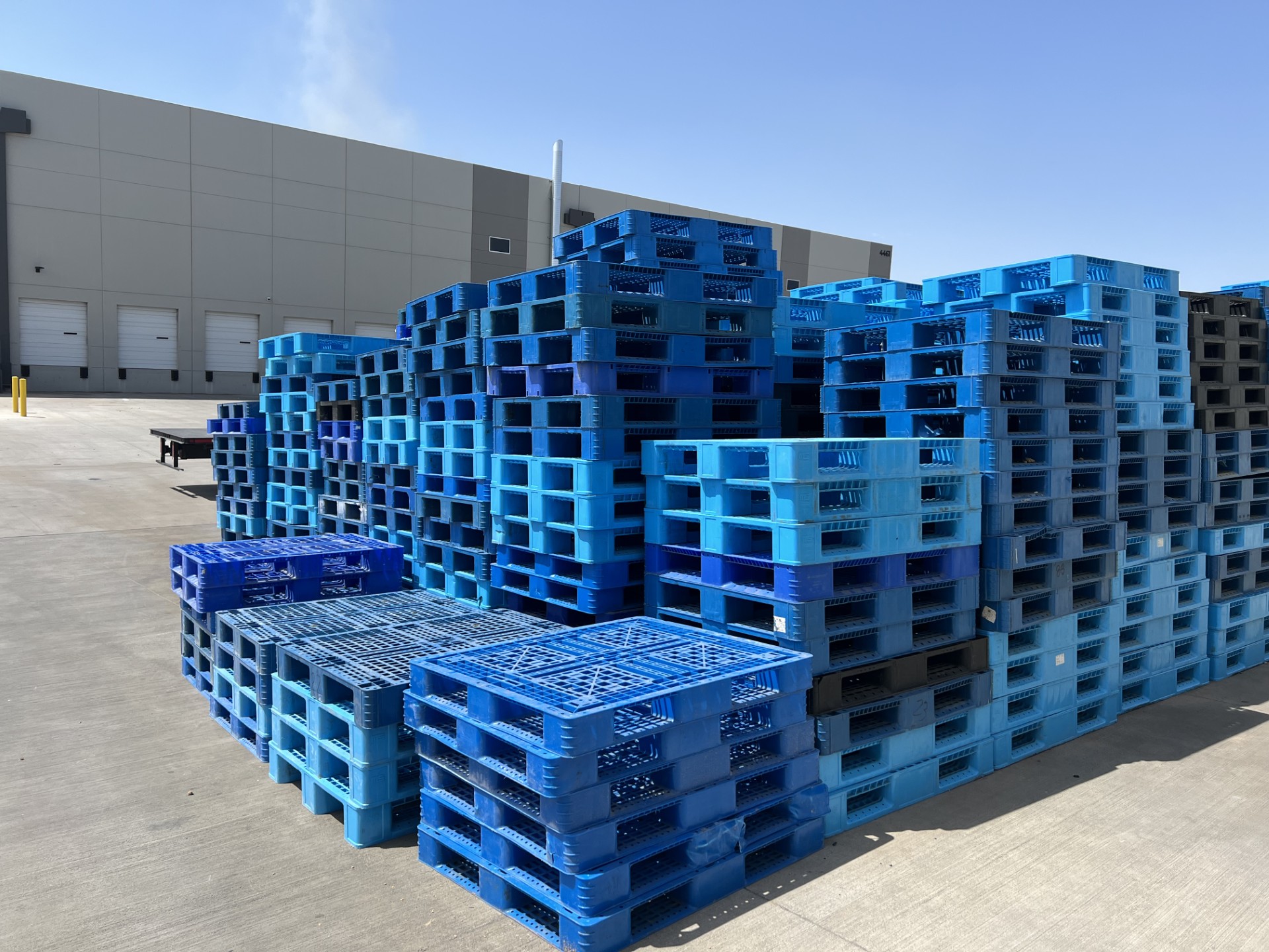 Large lot of pallets ready for pickup